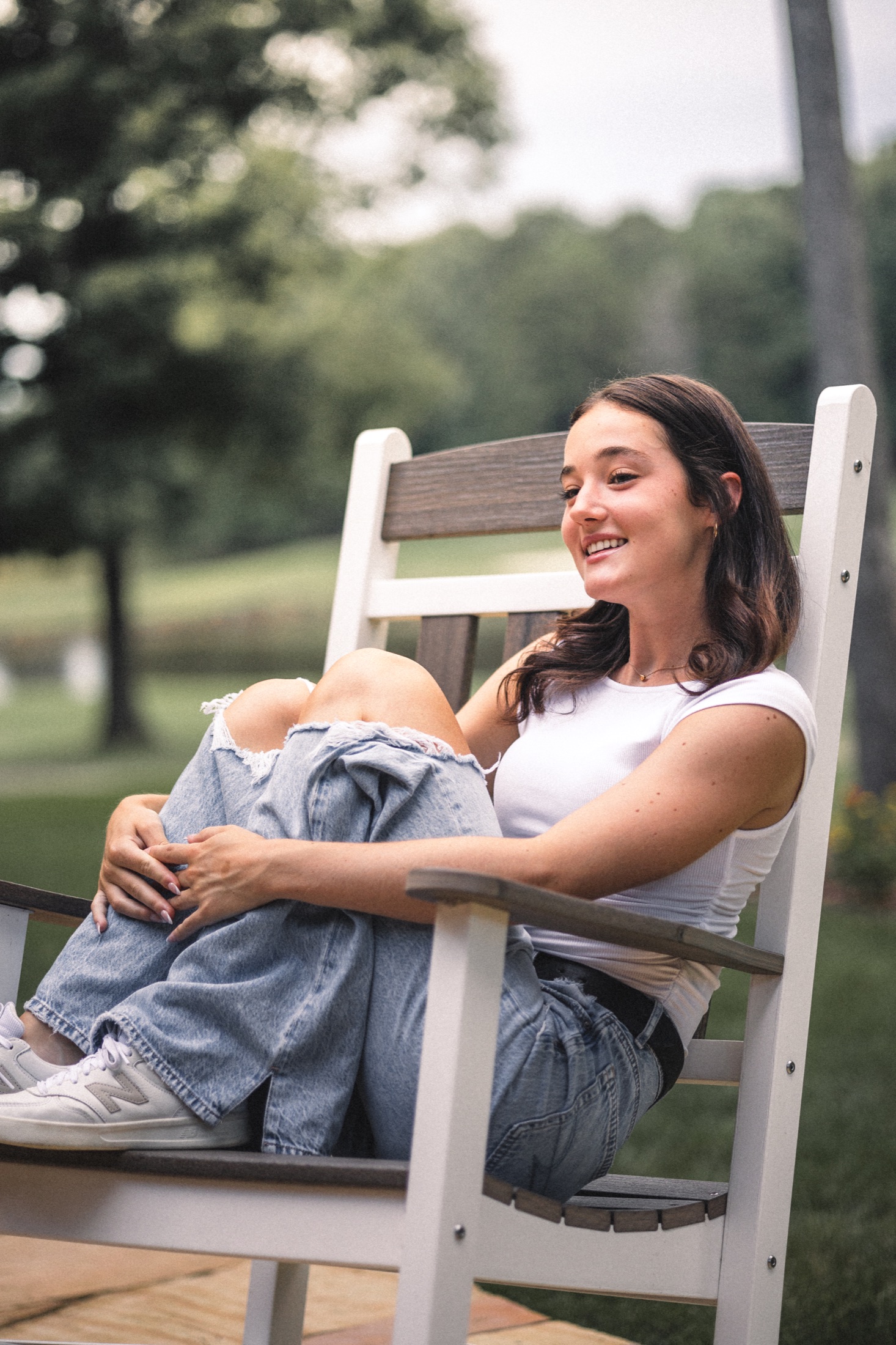 Seated outdoor portrait of Emma Jolliff